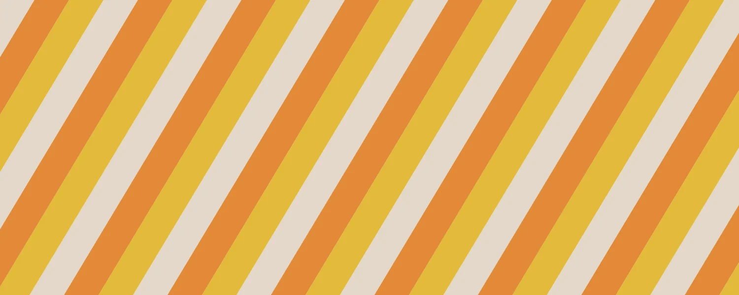 Halloween Notion cover with diagonal candy corn stripes in yellow, orange and cream