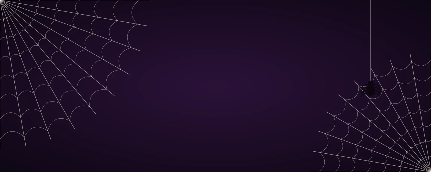 Halloween Notion cover with spider webs in two corners and a hanging spider